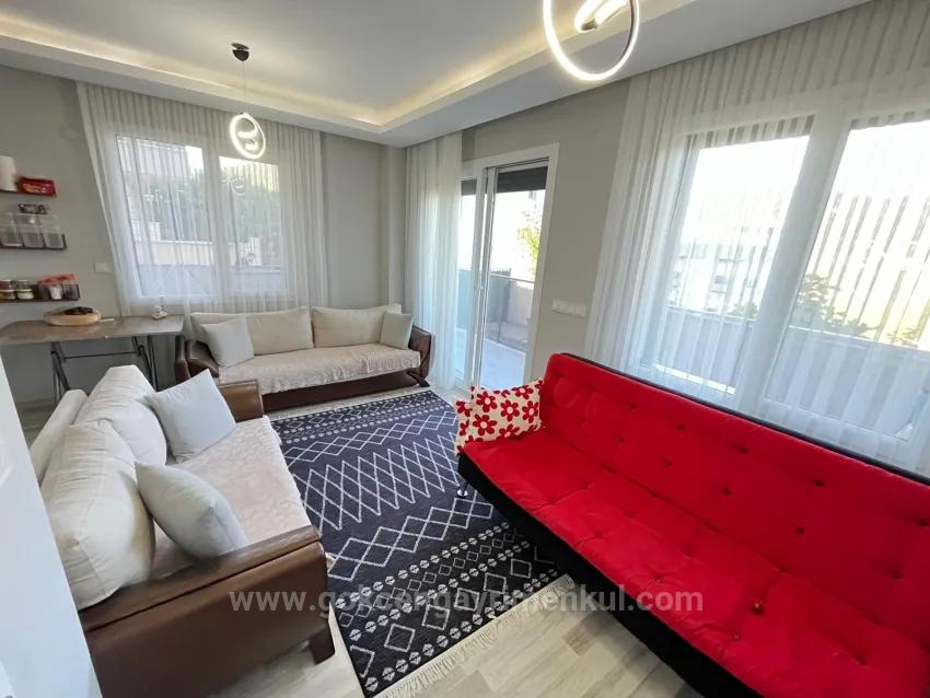 Im Gümüldür Bereich Der Gartenwohnung 2+1 Wohnung!