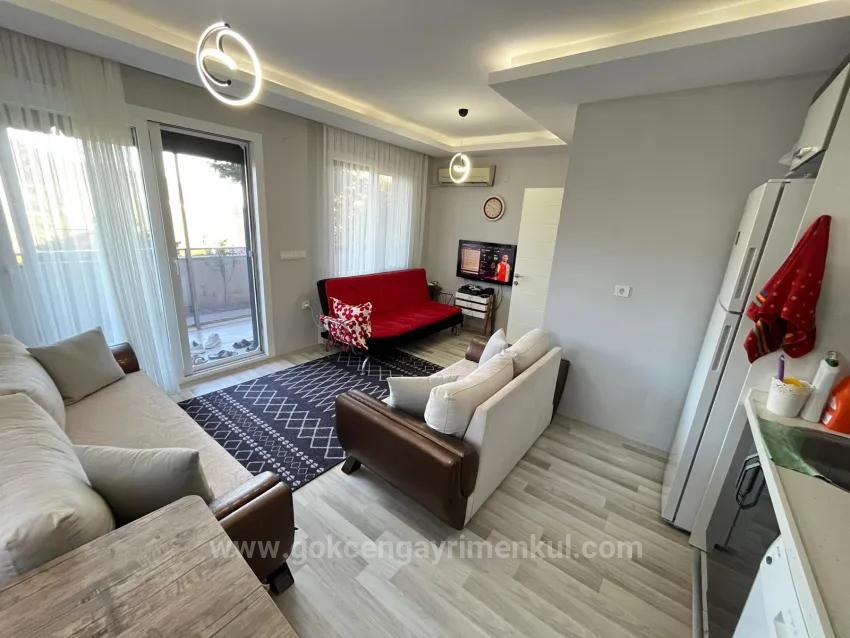Im Gümüldür Bereich Der Gartenwohnung 2+1 Wohnung!