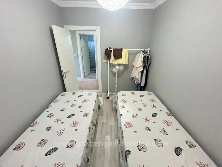 В Районе Гümüldür Садовый Этаж 2+1 Квартира!